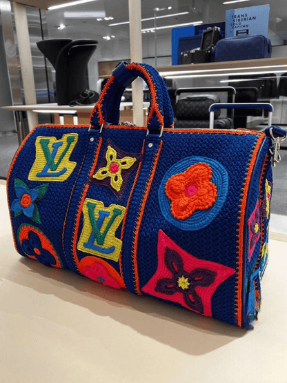 L.V
Crochet Keepall Bandoulière 50cm - KEITHWEAR.COM